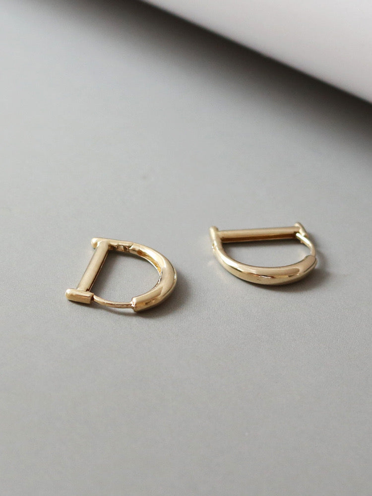 Capital D Huggie Hoops