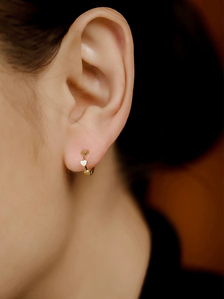 Three Hearts Twist Huggie Hoops