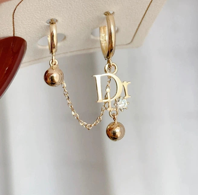 One Piece D Logo Chain Huggie Hoops Earring