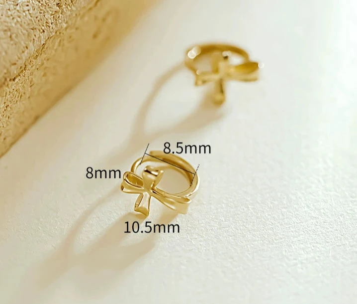 Fold Bow Cross Huggie Hoops