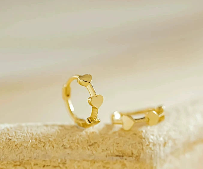 Three Hearts Twist Huggie Hoops