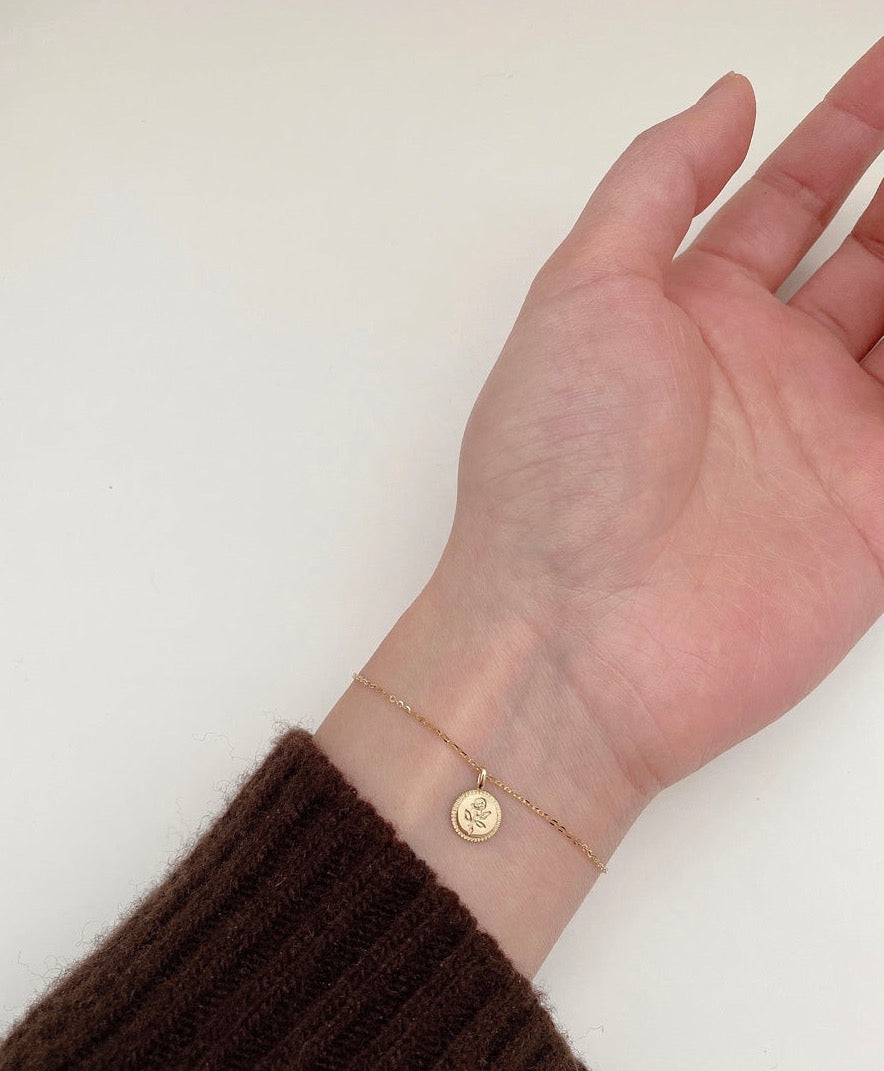 Carved Rose Coin Charm Bracelet