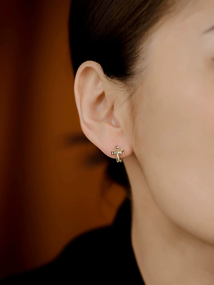 Fold Bow Cross Huggie Hoops