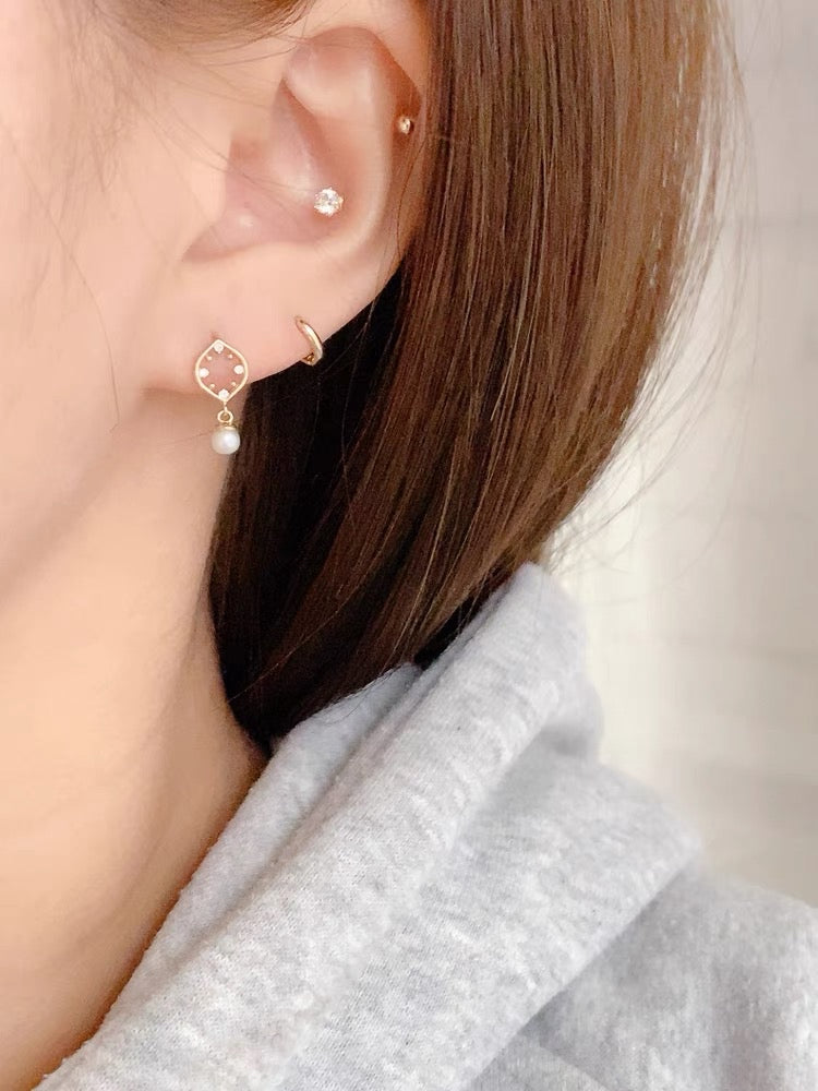 Paradigm Pearl Stud Earrings