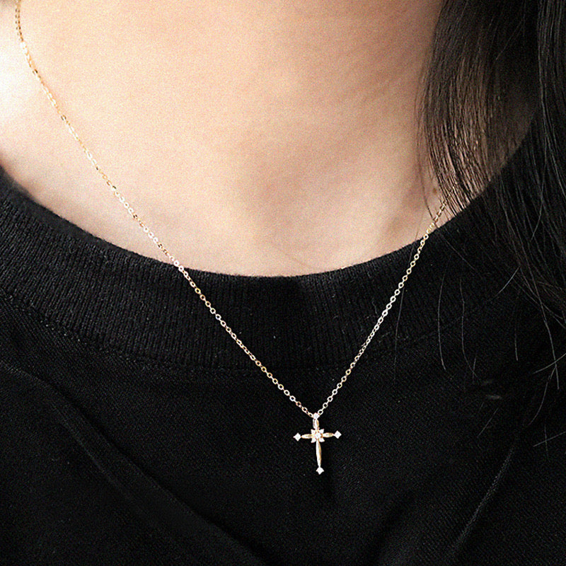 Nine Solitaire Cross Charm Necklace