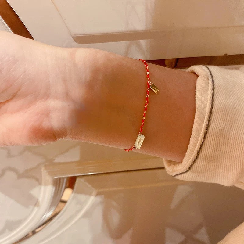 'Good Luck' Tag Red Rope Bracelet