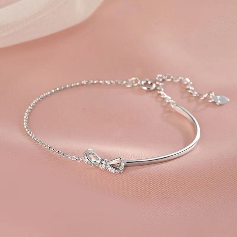 Half Bangle & Chain Bow Bracelet