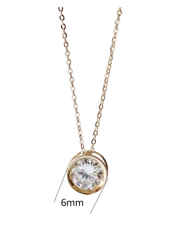 Caged Solitaire Wheel Charm Necklace