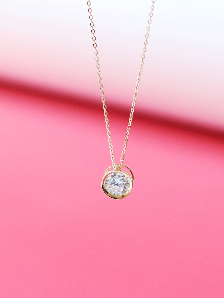 Caged Solitaire Wheel Charm Necklace