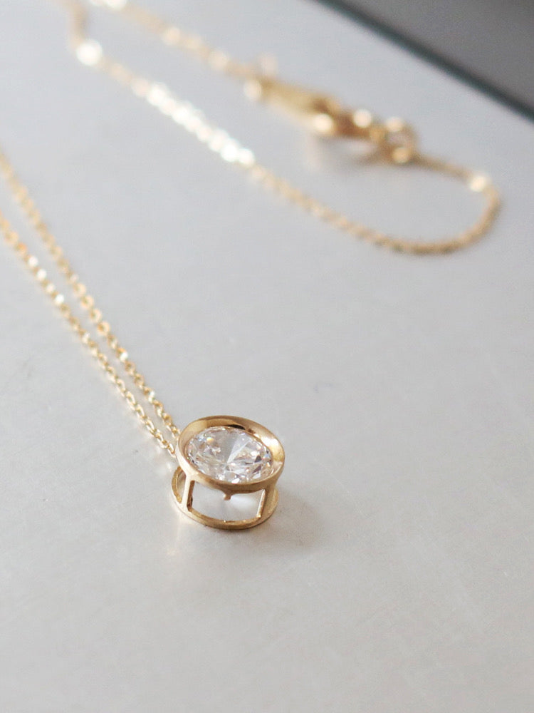 Caged Solitaire Wheel Charm Necklace