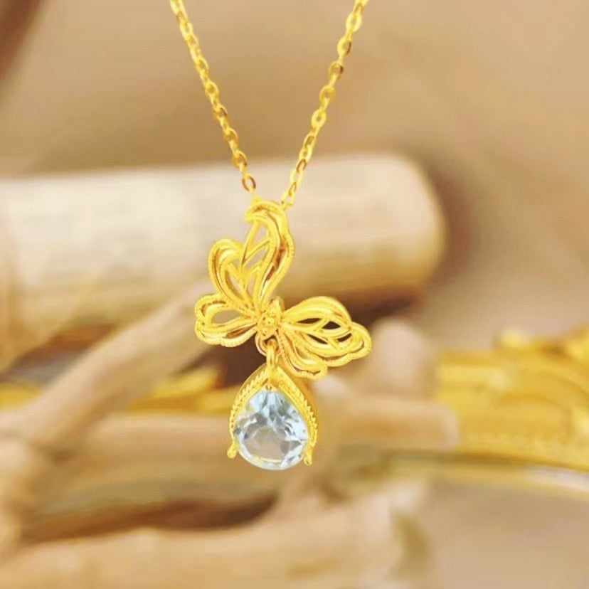 Bow Wrapped Tear Charm Necklace