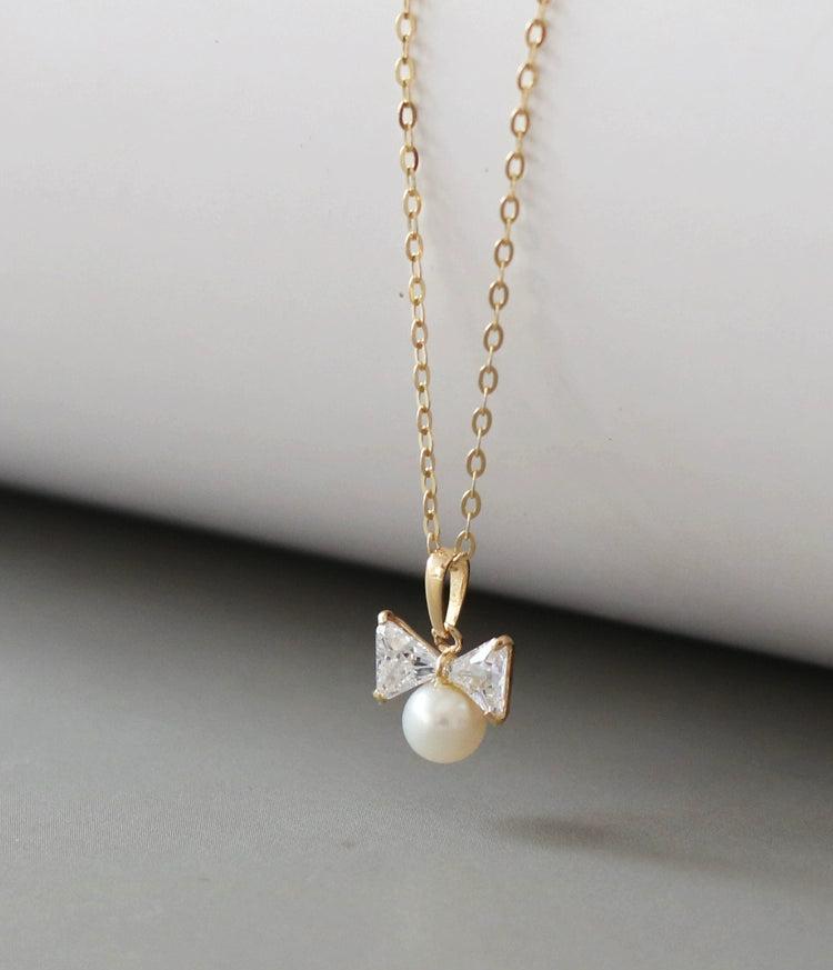 Bow Tie Pearl Charm Necklace