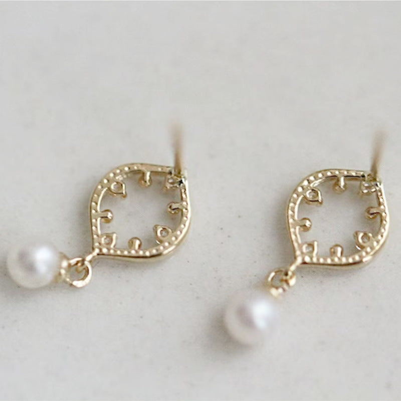 Paradigm Pearl Stud Earrings